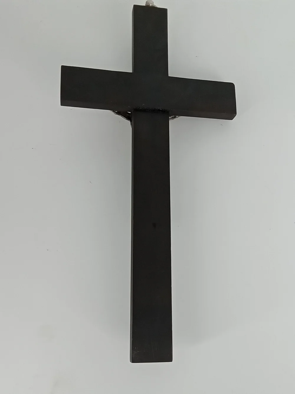 Crucifix ,Black Wall with Silver Corpus